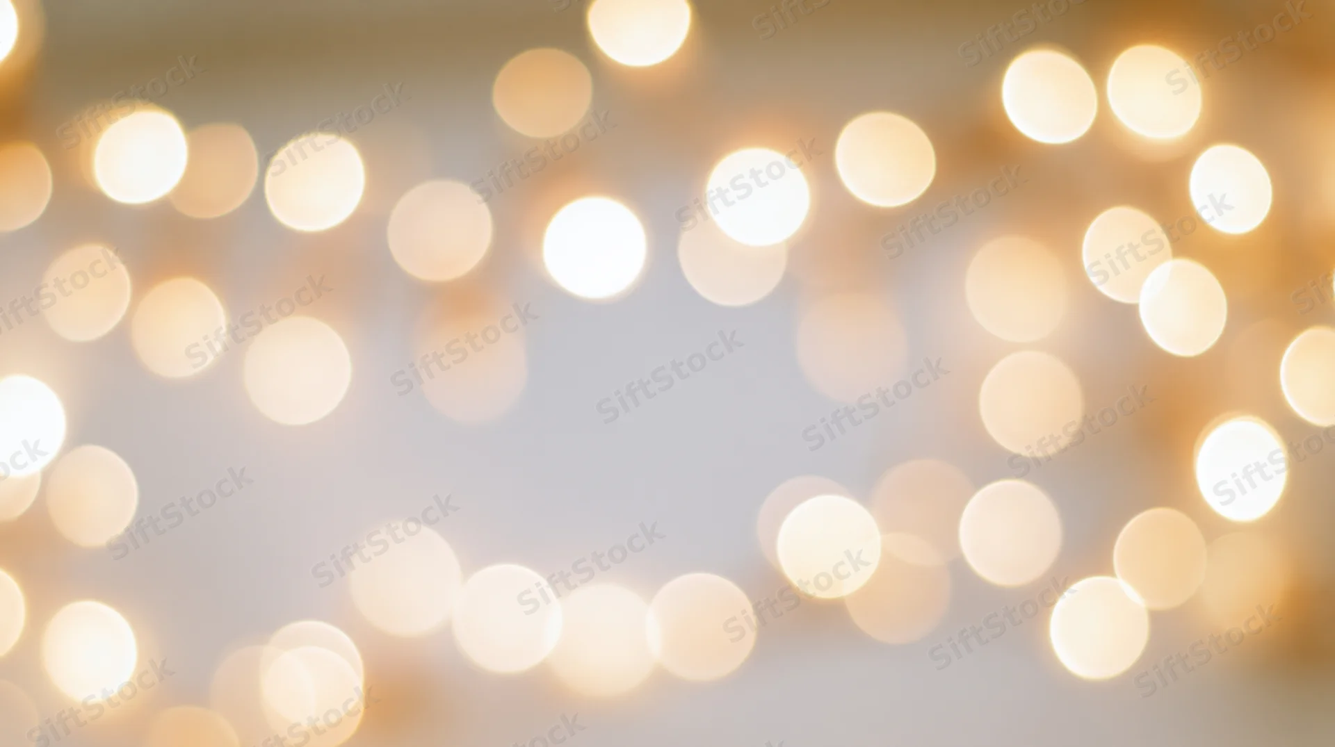 Soft out-of-focus bokeh lights forming a warm glowing background