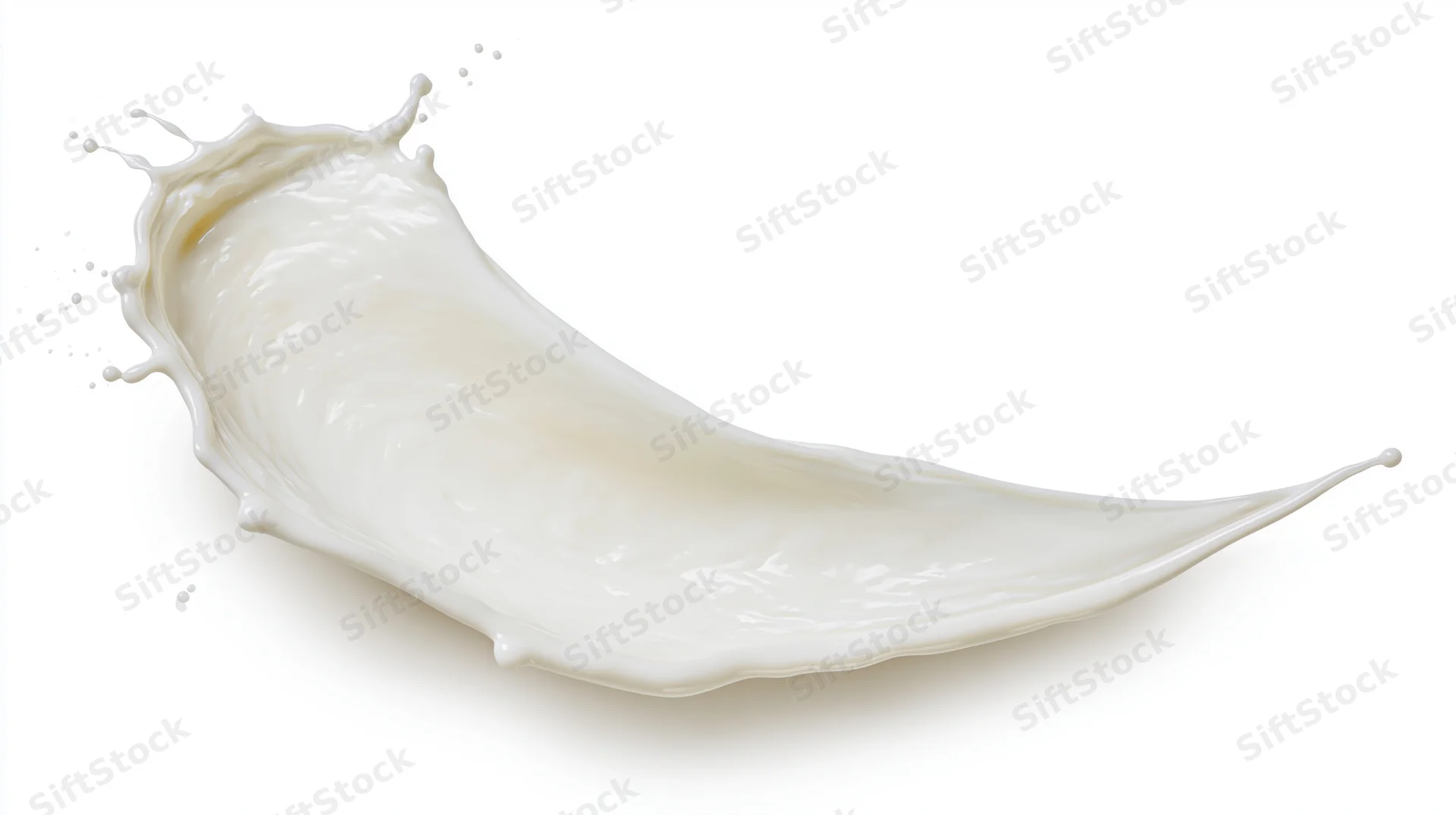 Milk splash frozen midair in curved wave form against white background
