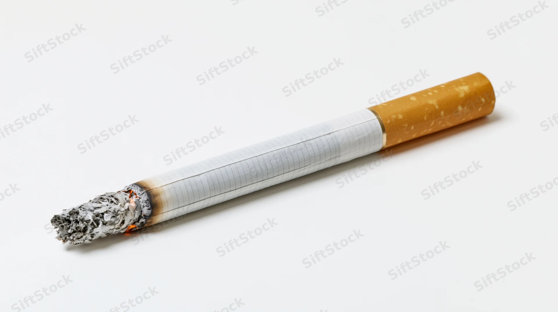 Lit cigarette with ash tip on white background
