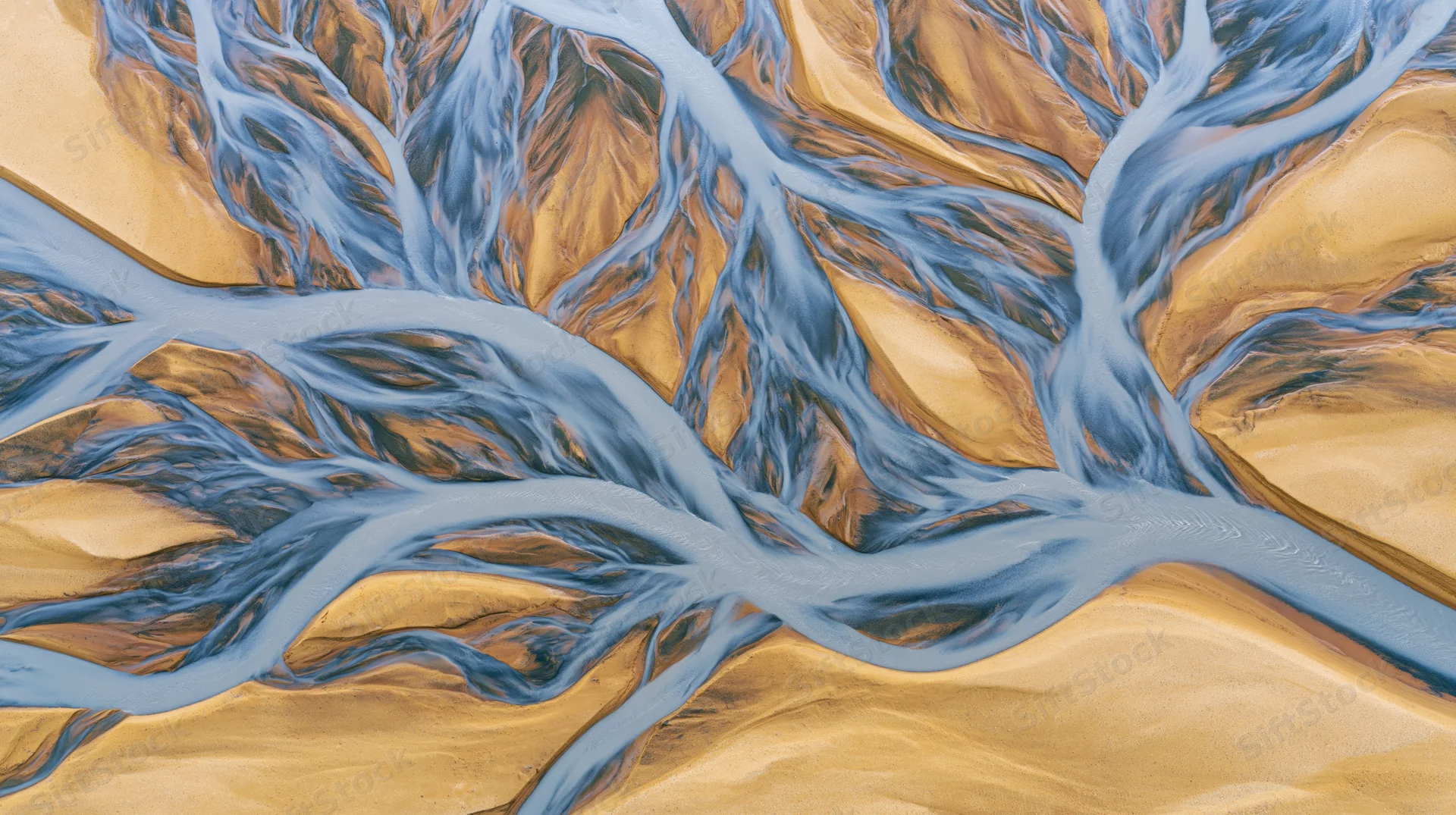 Aerial top-down view of a braided glacial river delta in iceland