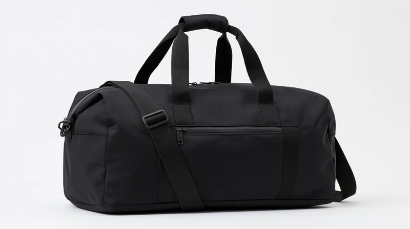 Black nylon duffel bag with top handles and front zipper pocket on white background
