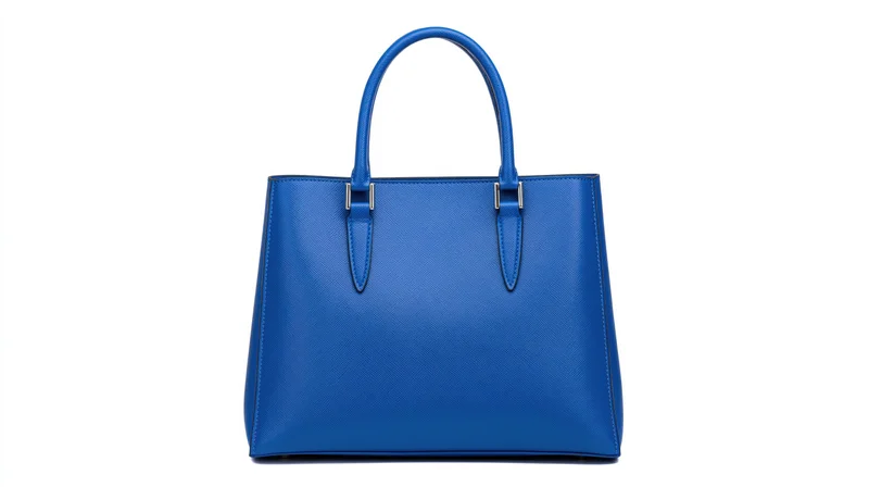 Blue saffiano leather structured tote handbag with dual top handles isolated on white