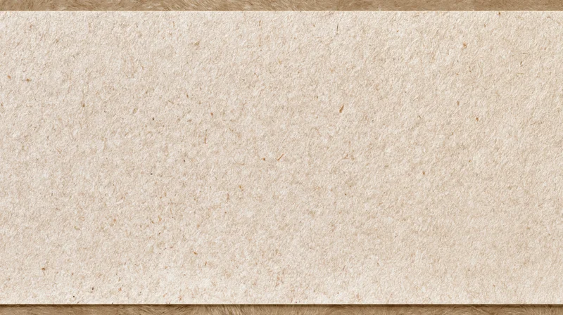 Close-up flat lay of recycled kraft paper surface filling the frame