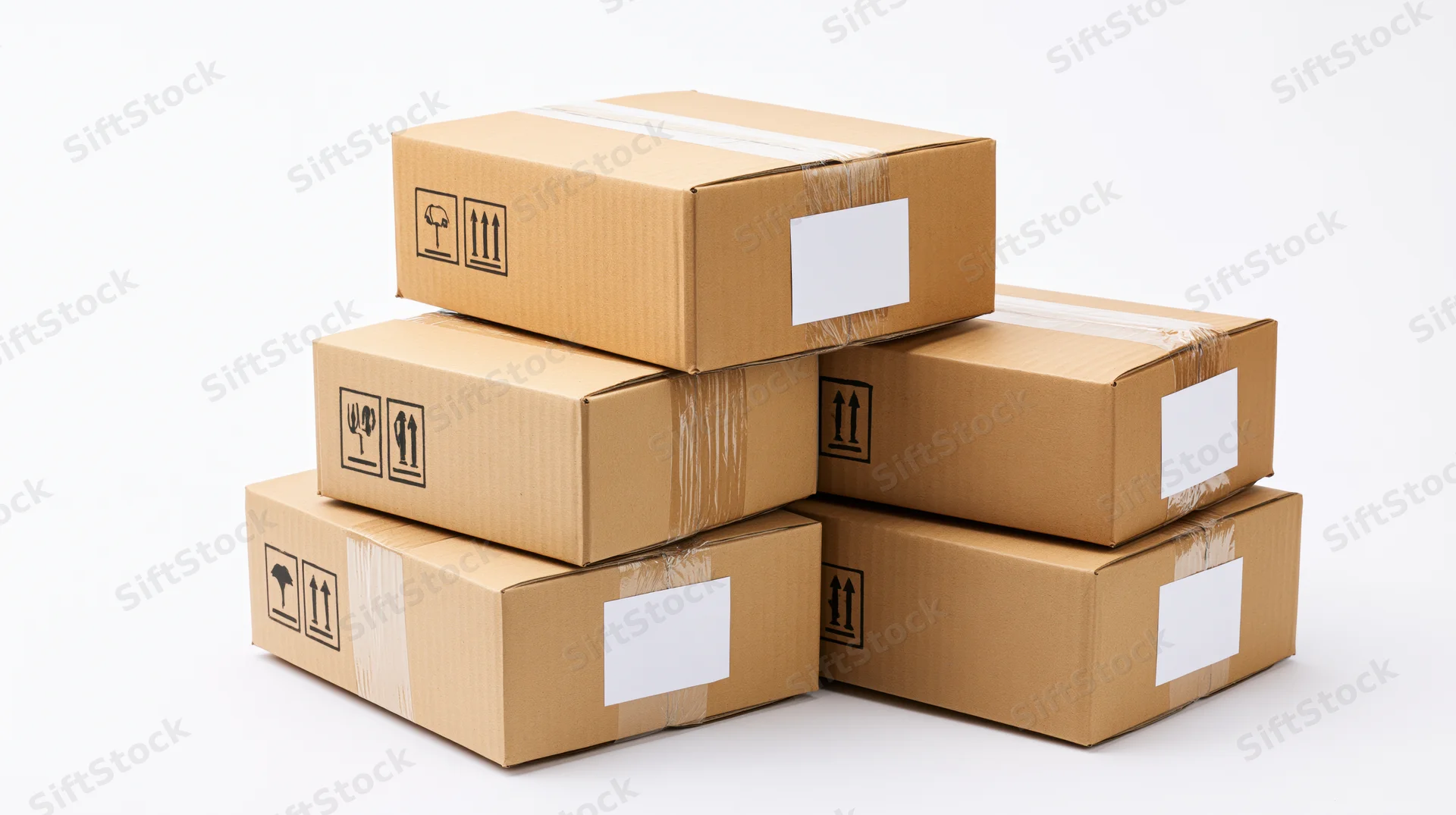 Five sealed corrugated cardboard shipping boxes stacked in a pyramid formation on a white background