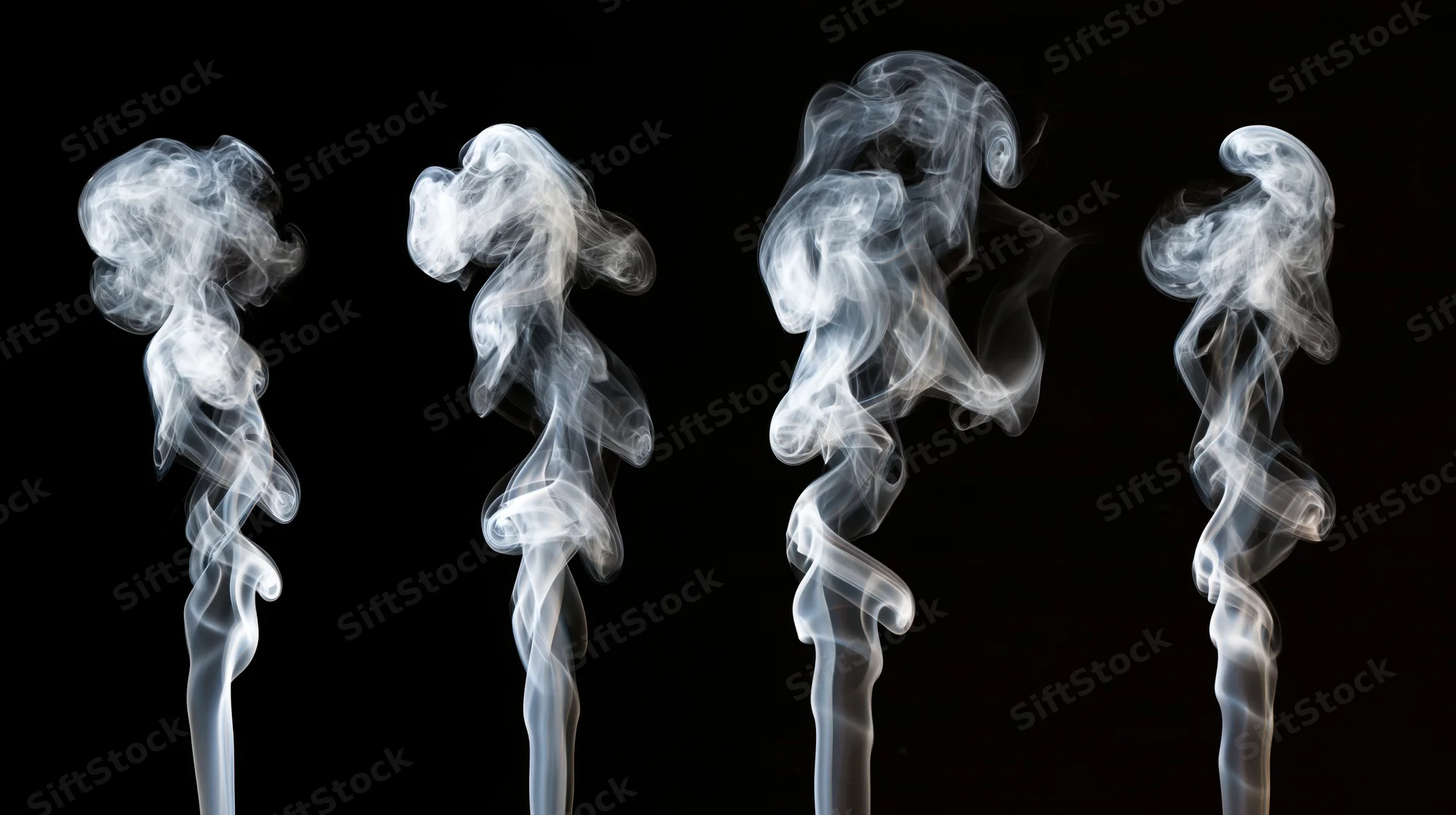 Four white smoke wisps rising vertically against a black background