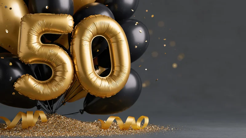 Gold foil 50 balloon letters tied together with black balloons