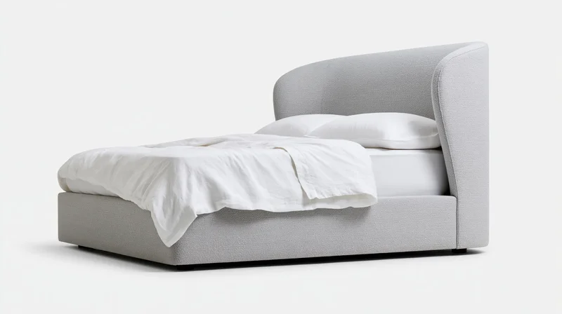 Modern upholstered platform bed with curved winged headboard on white background