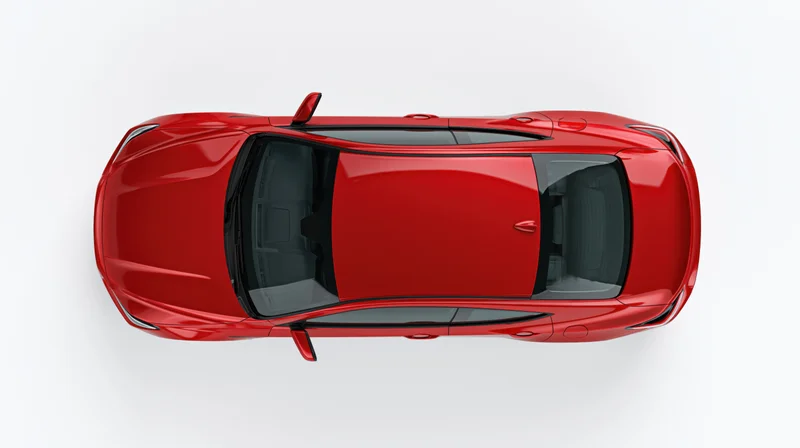 Red sporty coupe sedan viewed from directly overhead against white background