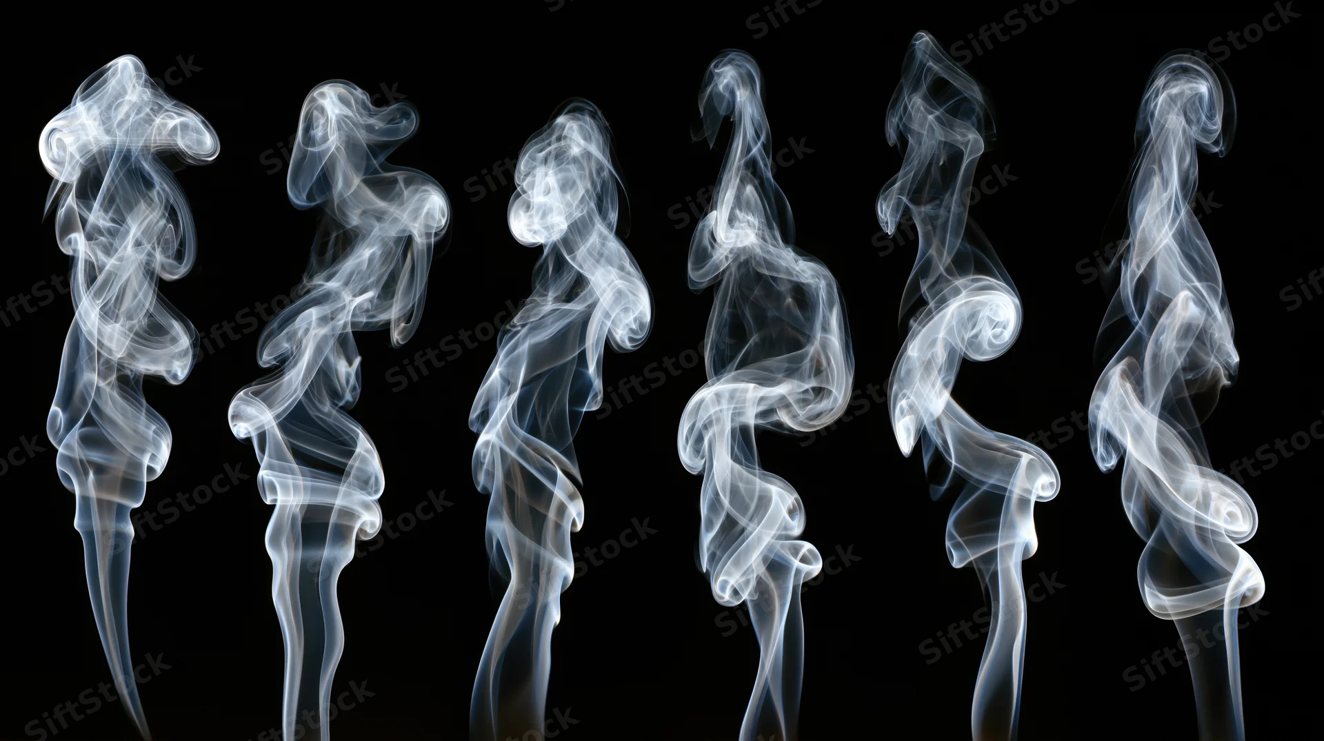 Six wisps of white smoke rising and curling against a black background