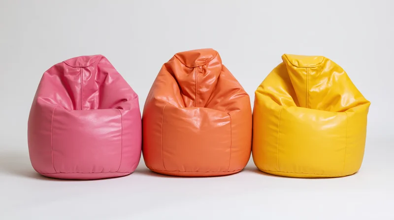 Three colorful beanbag chairs arranged in a row on a white background
