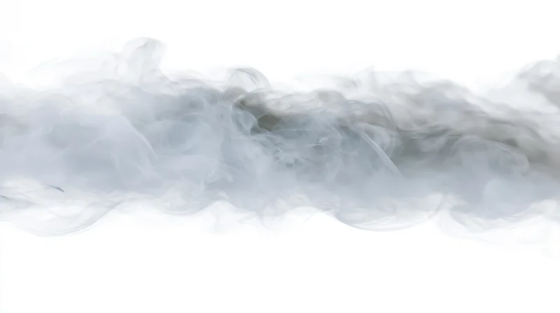 Wispy smoke drifting horizontally across a pure white background