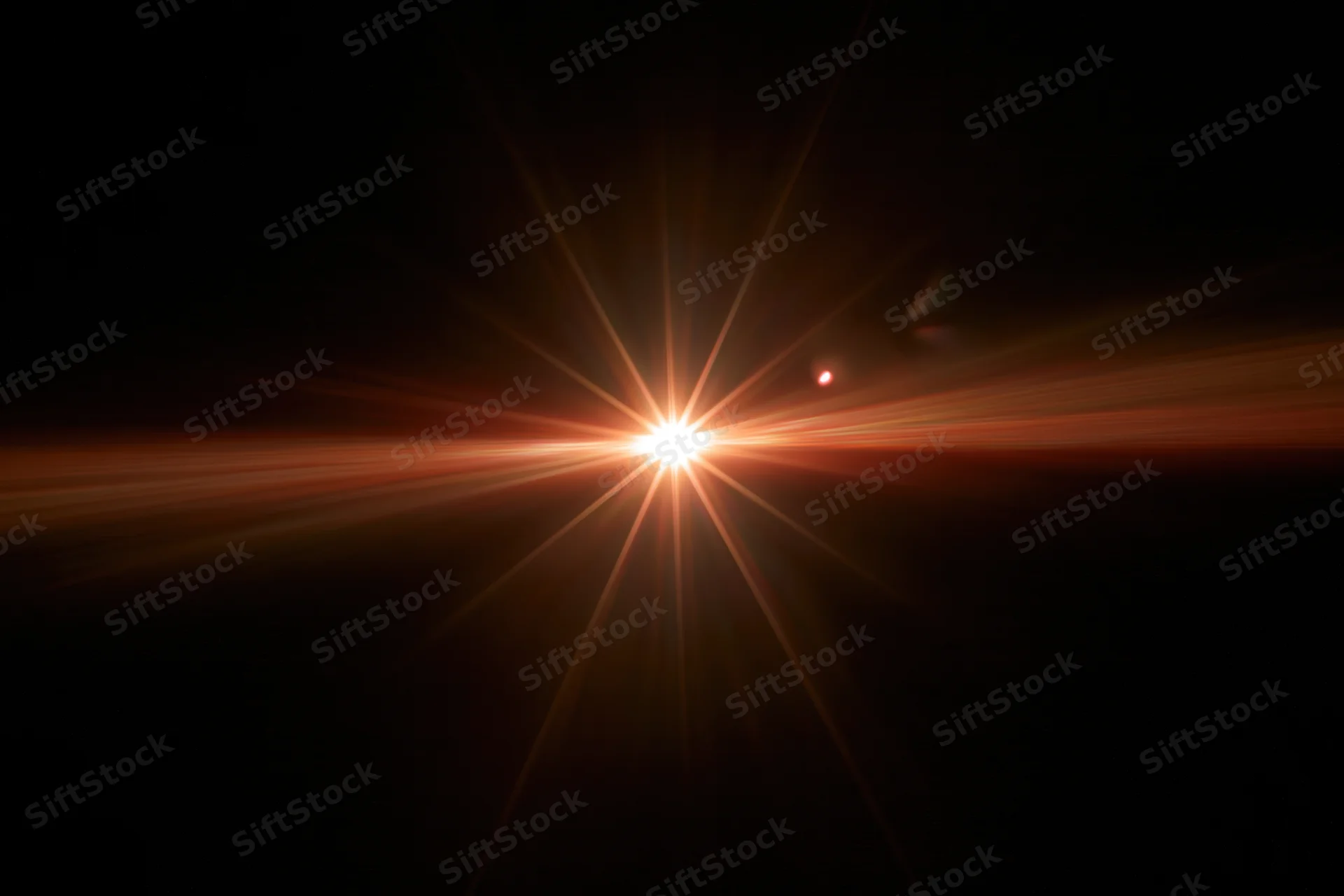 Bright point of light bursting with rays against black background