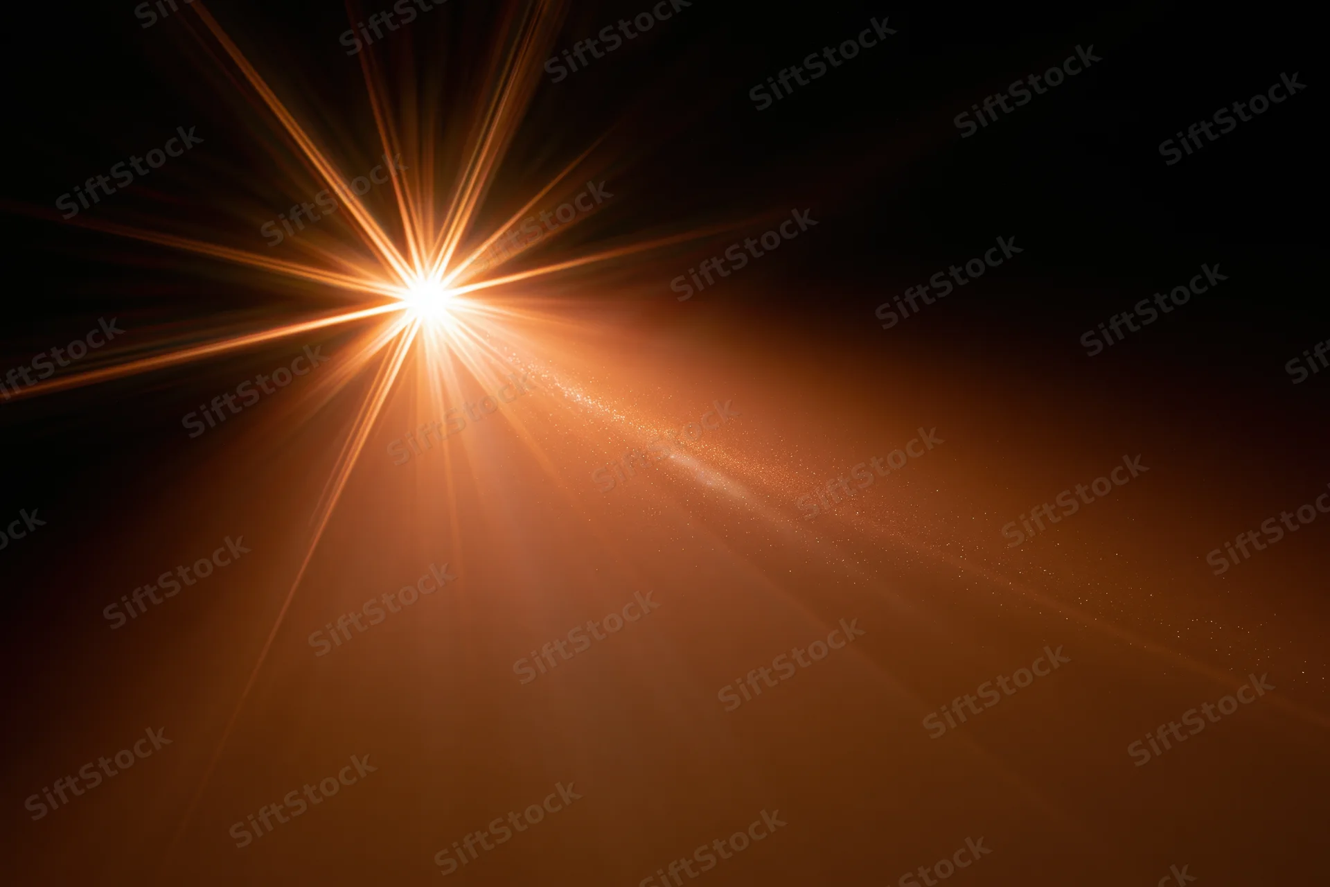 Intense light burst radiating from upper left corner with warm glow and particle trails across dark background