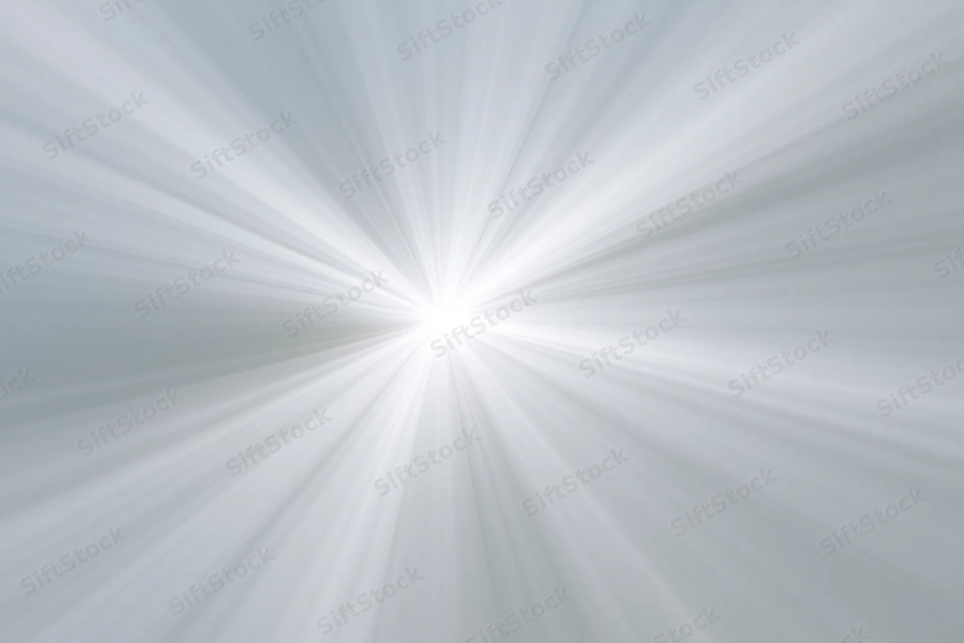 Soft radial burst of light rays emanating from a bright center