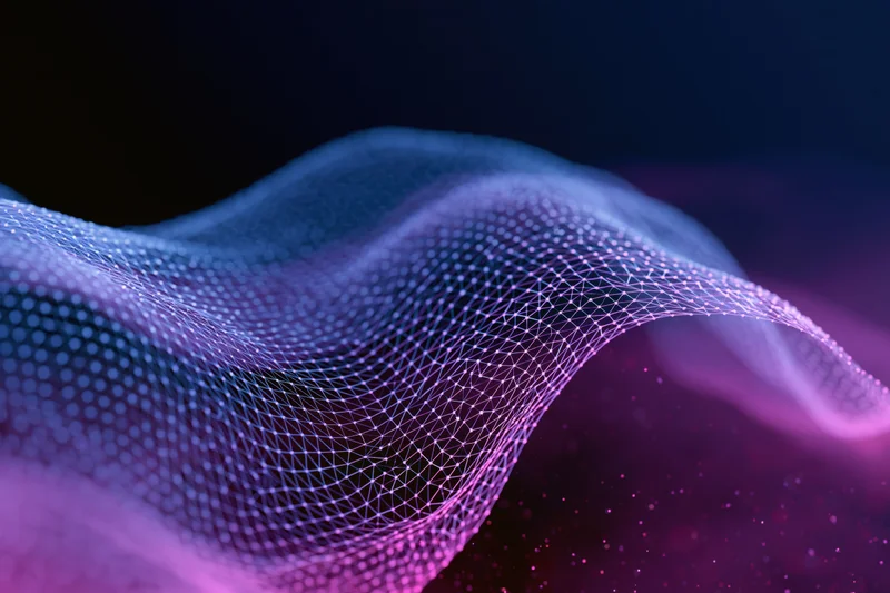 Glowing digital wave made of dot-grid mesh flowing in dark space
