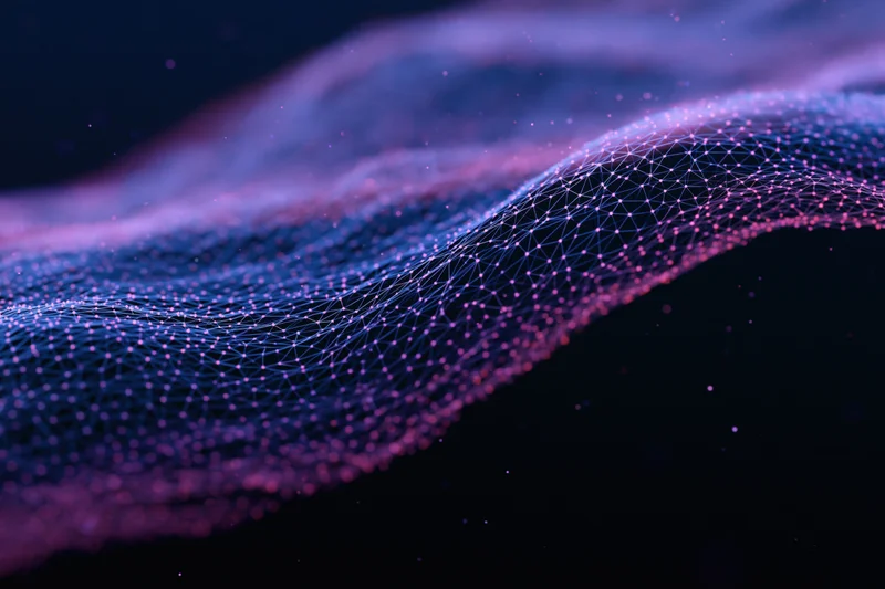 Glowing digital wave made of dot-grid mesh flowing in dark space