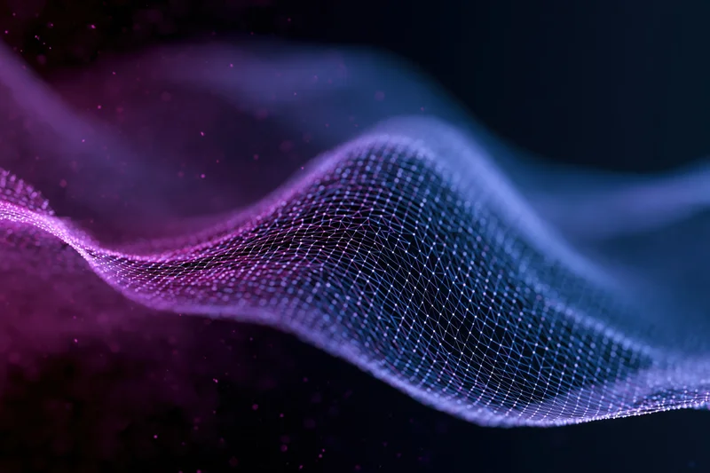 Glowing digital wave made of dot-grid mesh flowing in dark space
