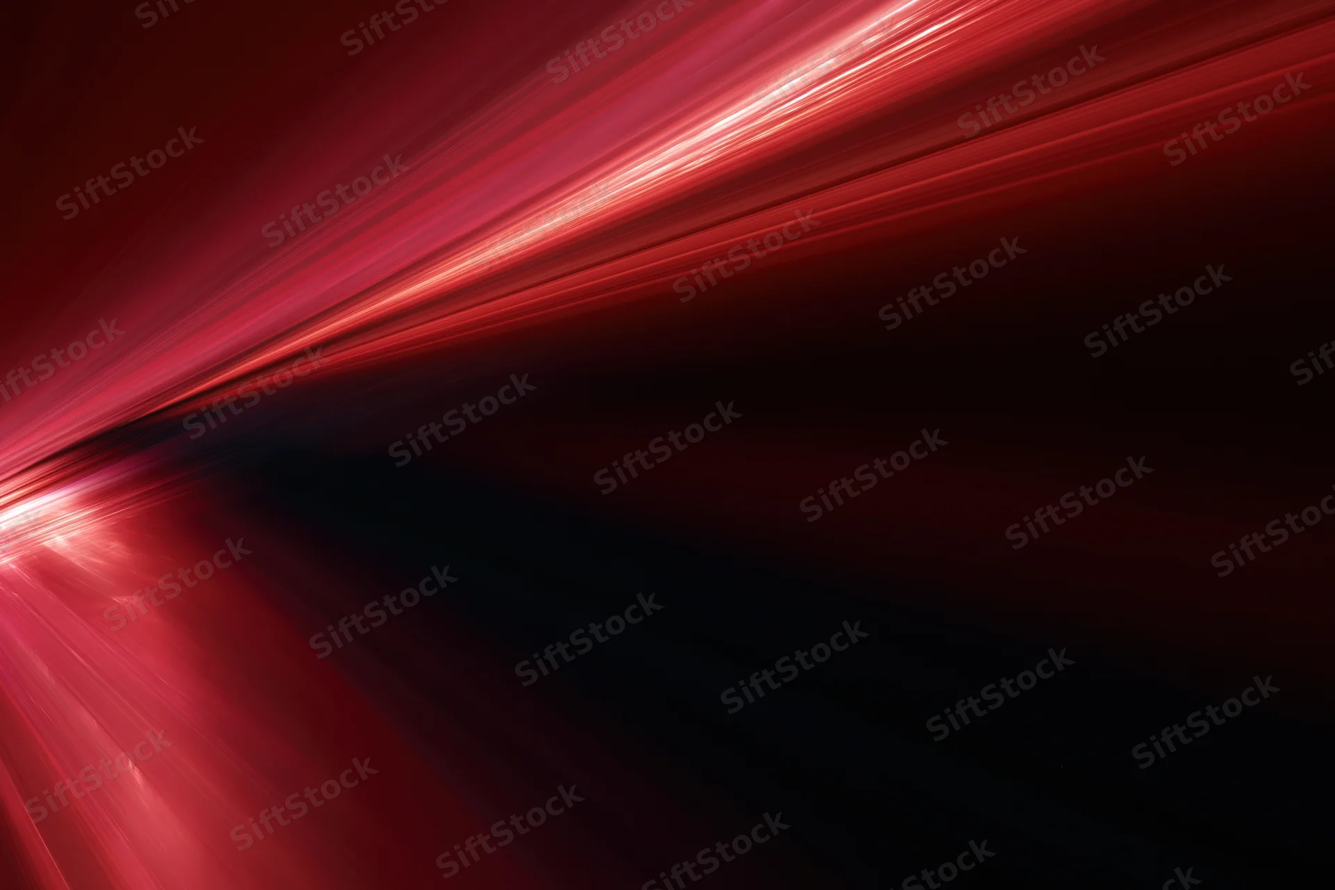 Red light streaks moving diagonally across dark background with glowing trails