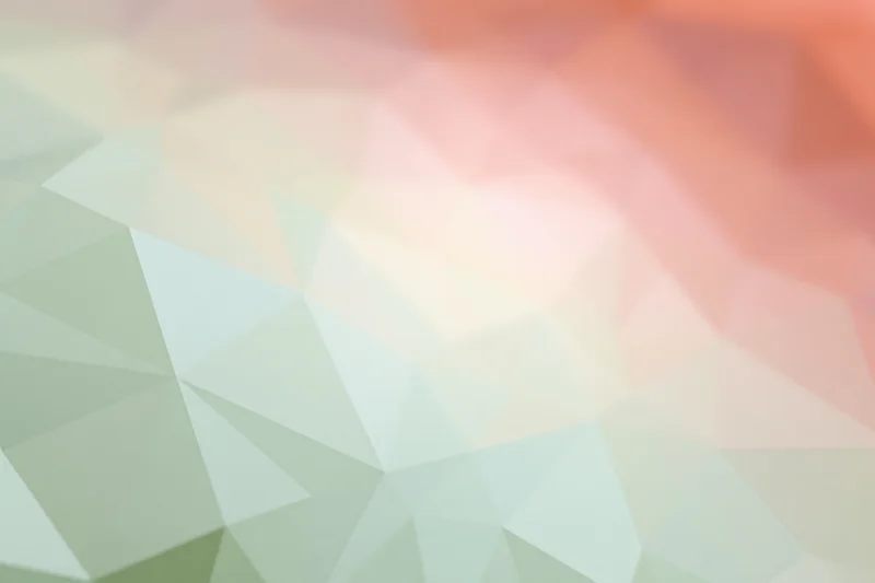 Abstract low-poly geometric pattern in soft pastel colors arranged as a flat lay background