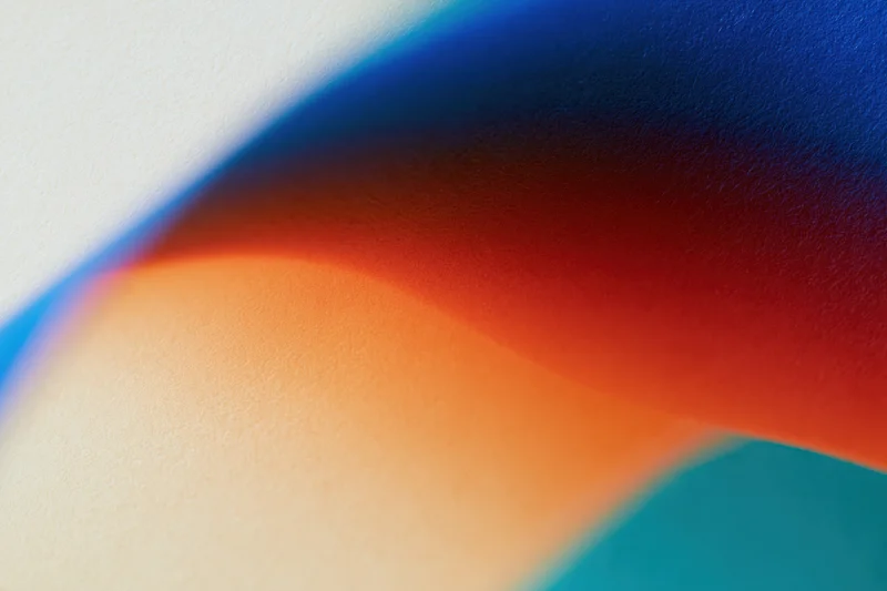 Soft overlapping color gradients blending in abstract composition