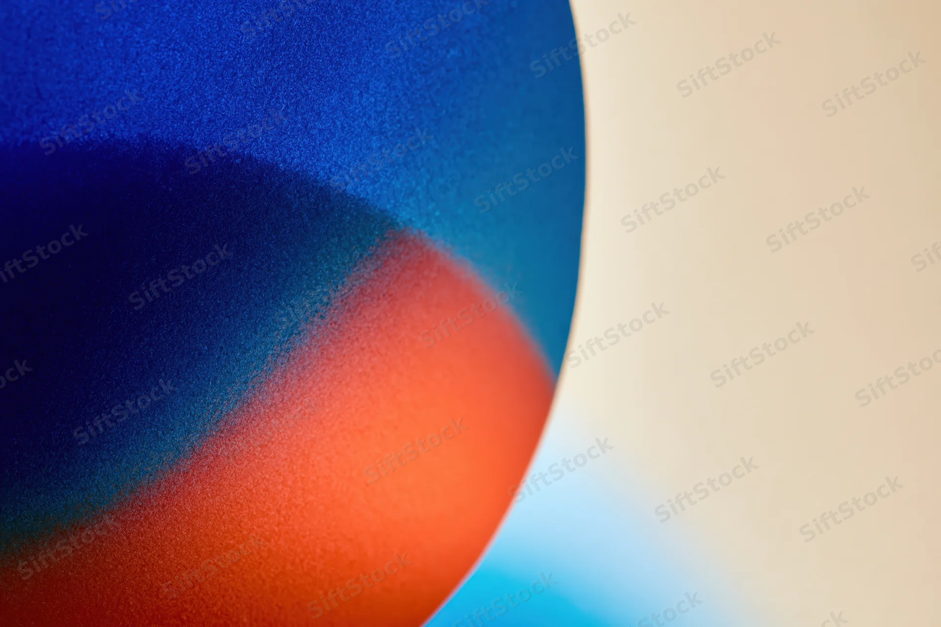 Soft gradient blur of overlapping blue and red colors forming an abstract composition with copyspace
