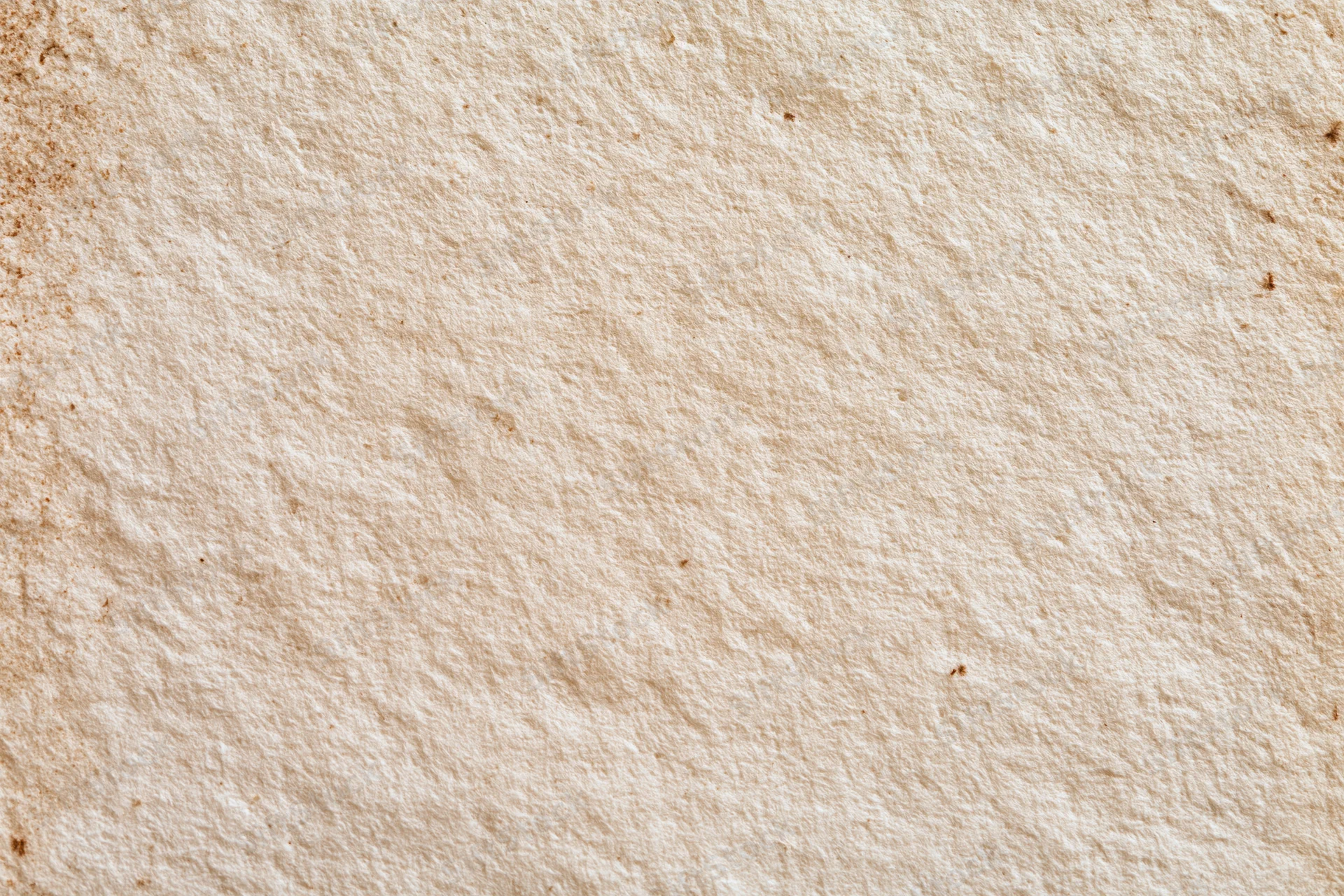 Aged paper texture filling the frame in flat lay macro view
