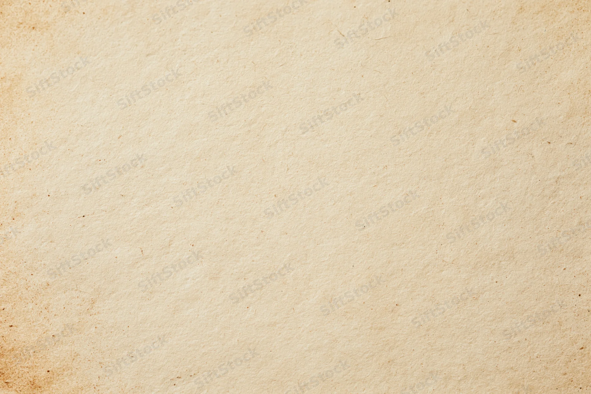 Aged paper texture filling the frame in a flat lay macro view