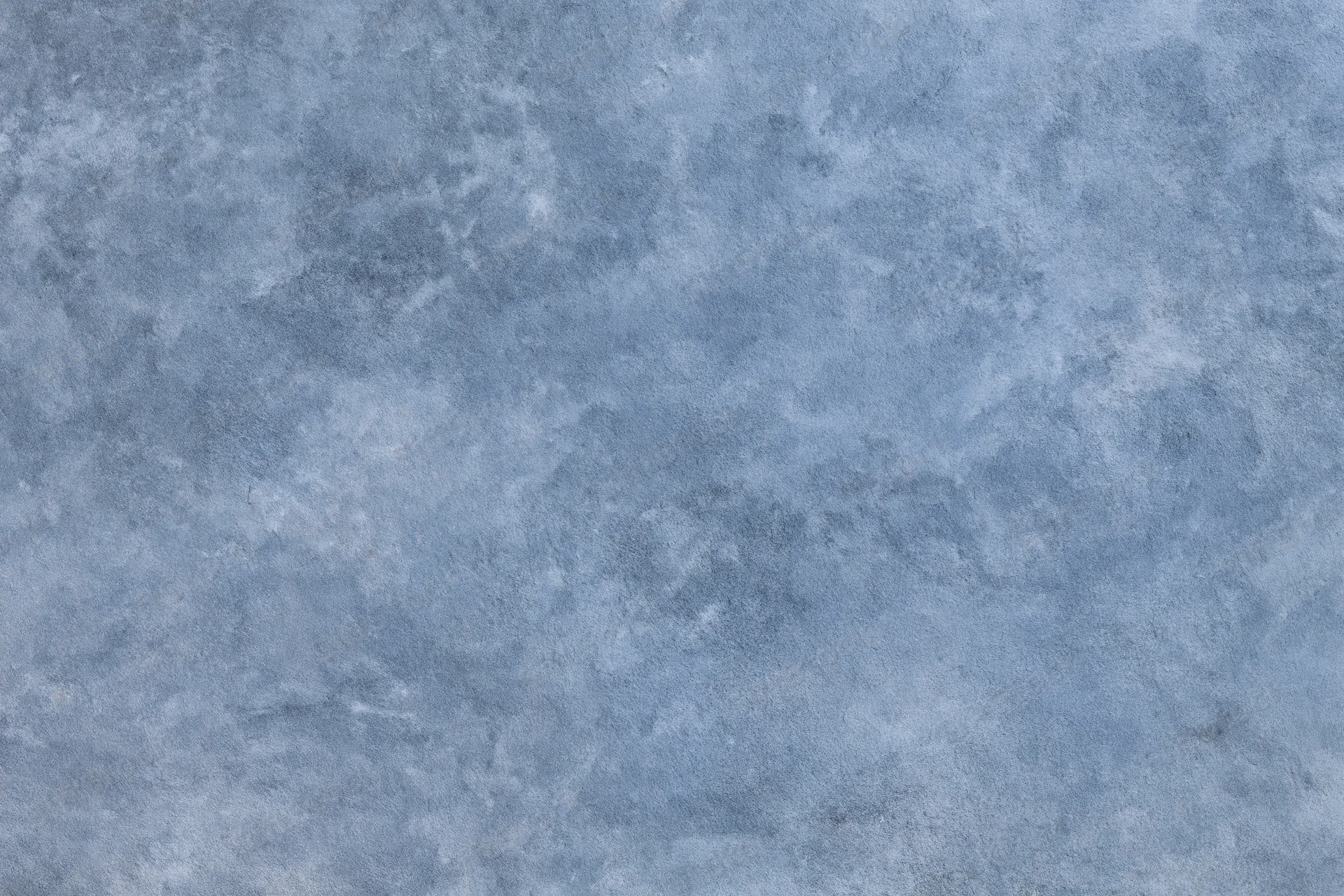 Aged plaster wall surface with distressed texture filling the frame