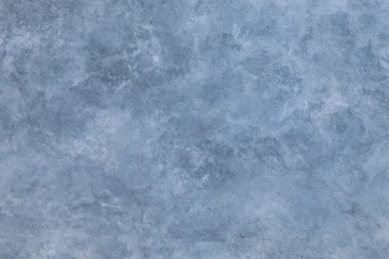 Aged plaster wall surface with distressed texture filling the frame