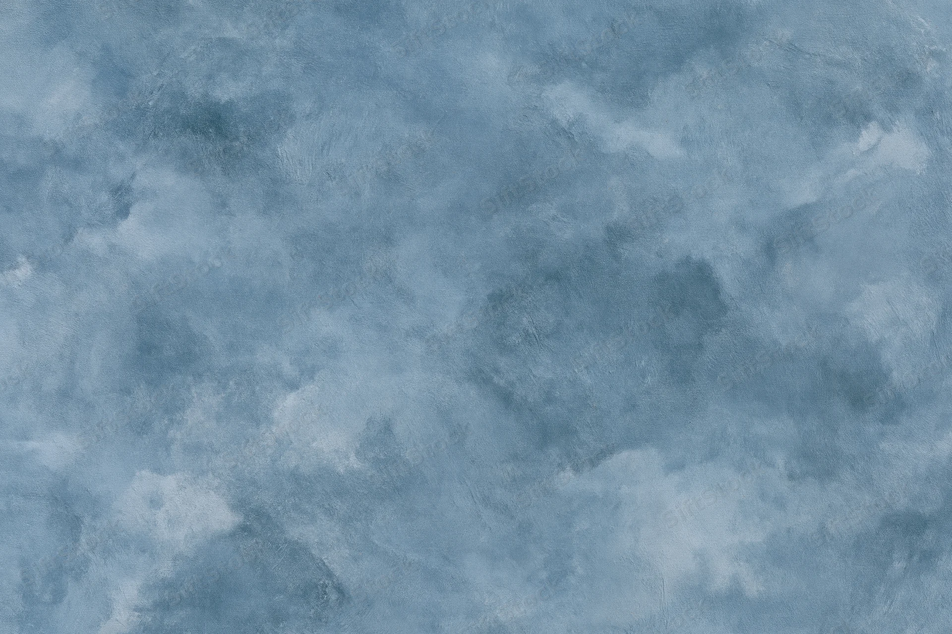 Aged plaster wall surface with mottled blue-gray texture filling the frame