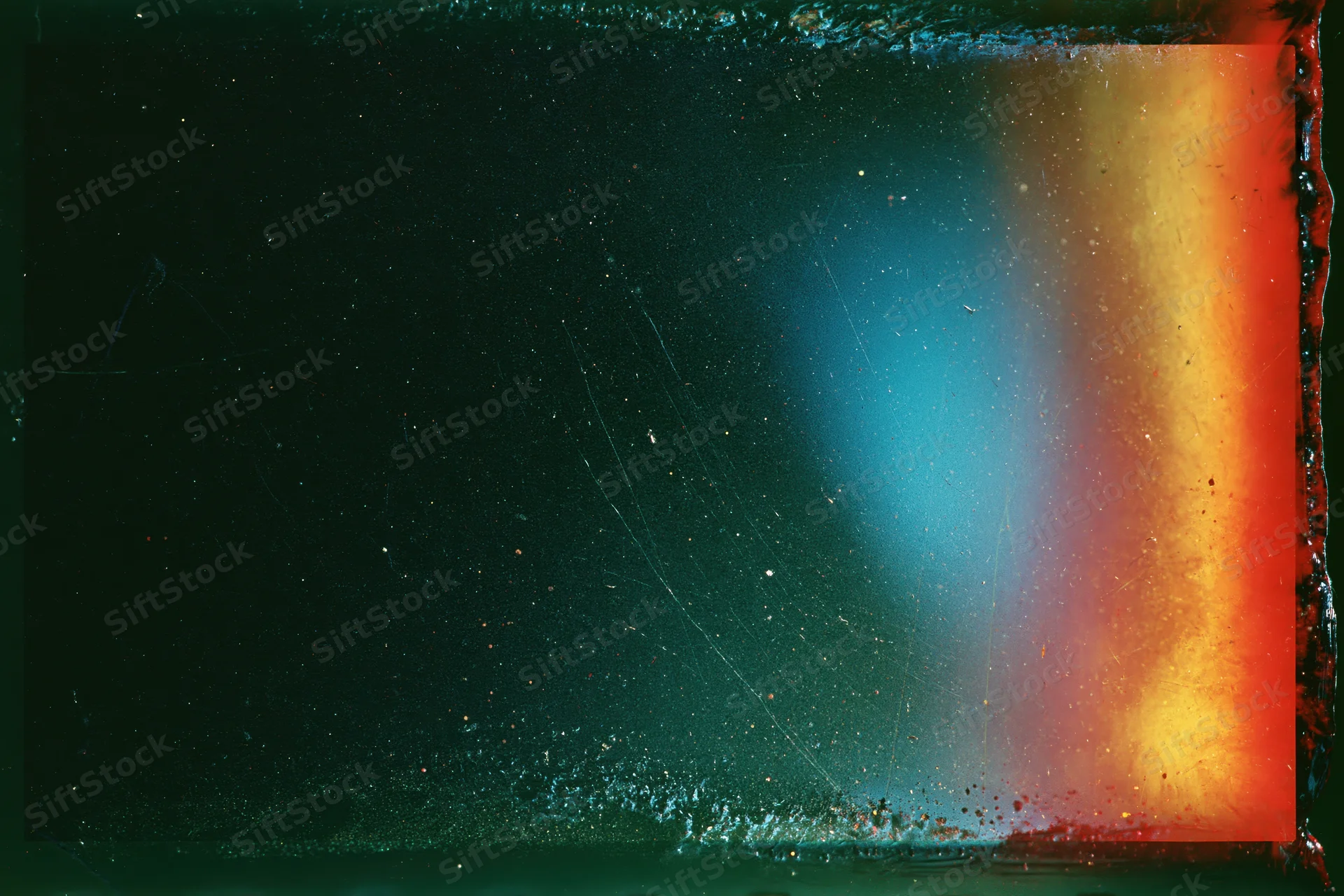 Exposed 35mm film frame with light leak damage and color bleed along the edges