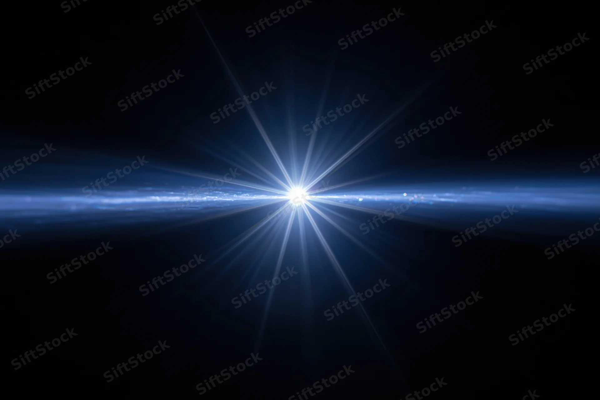 Bright blue-white lens flare burst centered against a dark background with radial light beams