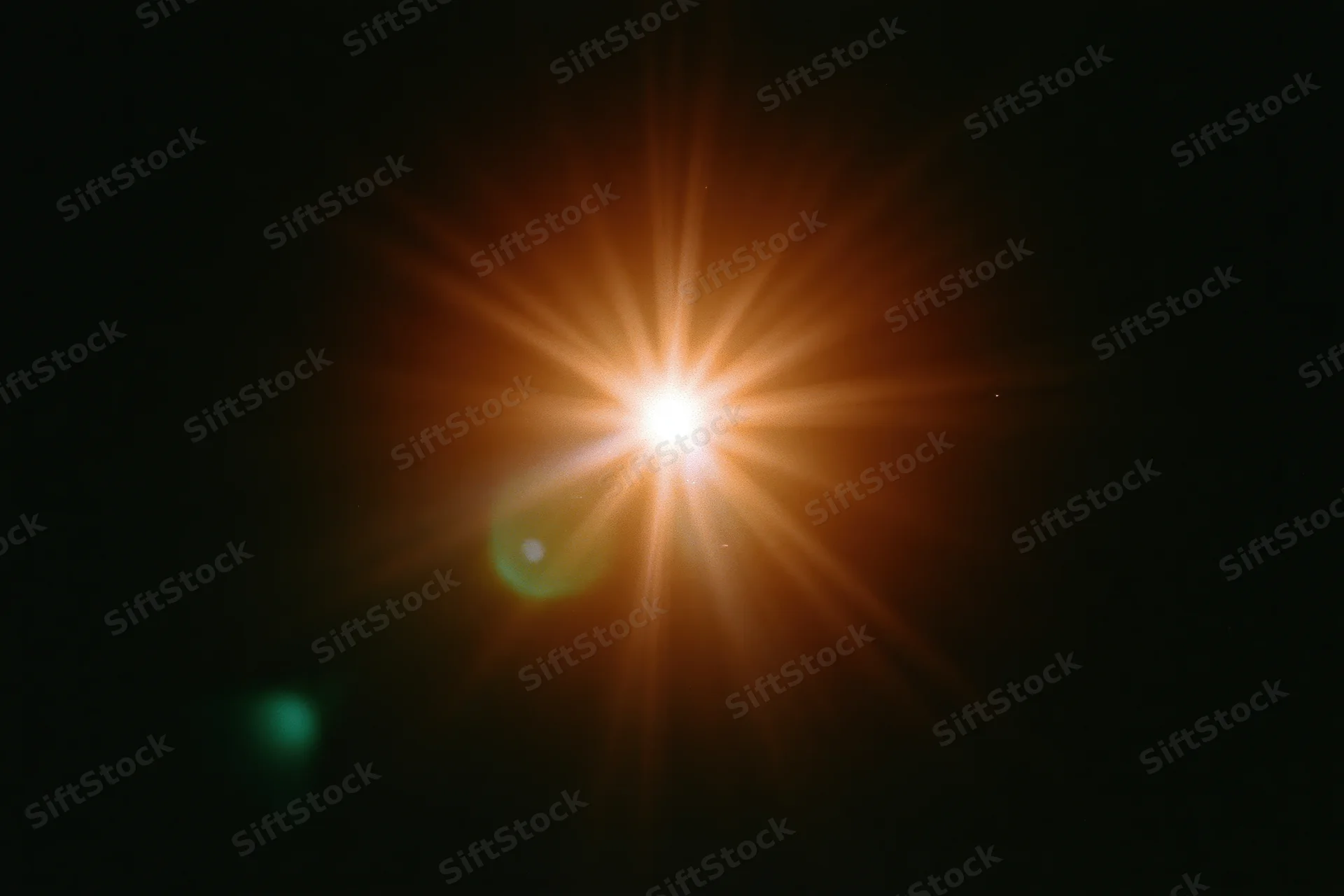Bright point light source glowing with starburst flare against pure black background