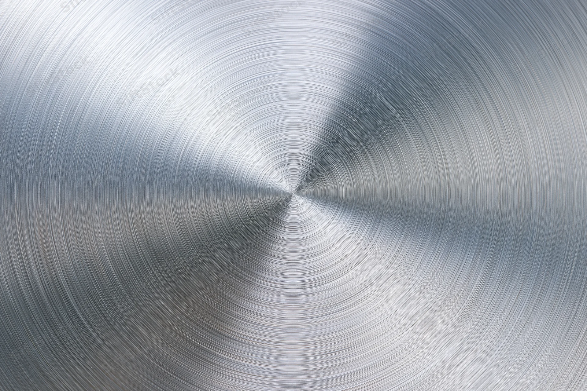 Brushed aluminum metal surface with radial concentric circular texture