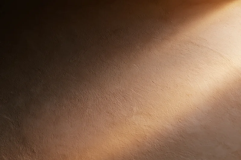 Smooth plastered wall surface with soft light and shadow in interior space