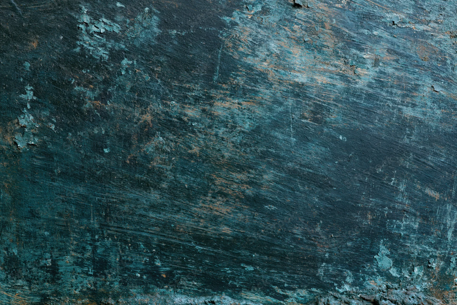 Close-up of a weathered painted metal surface showing peeling blue paint and rust streaks