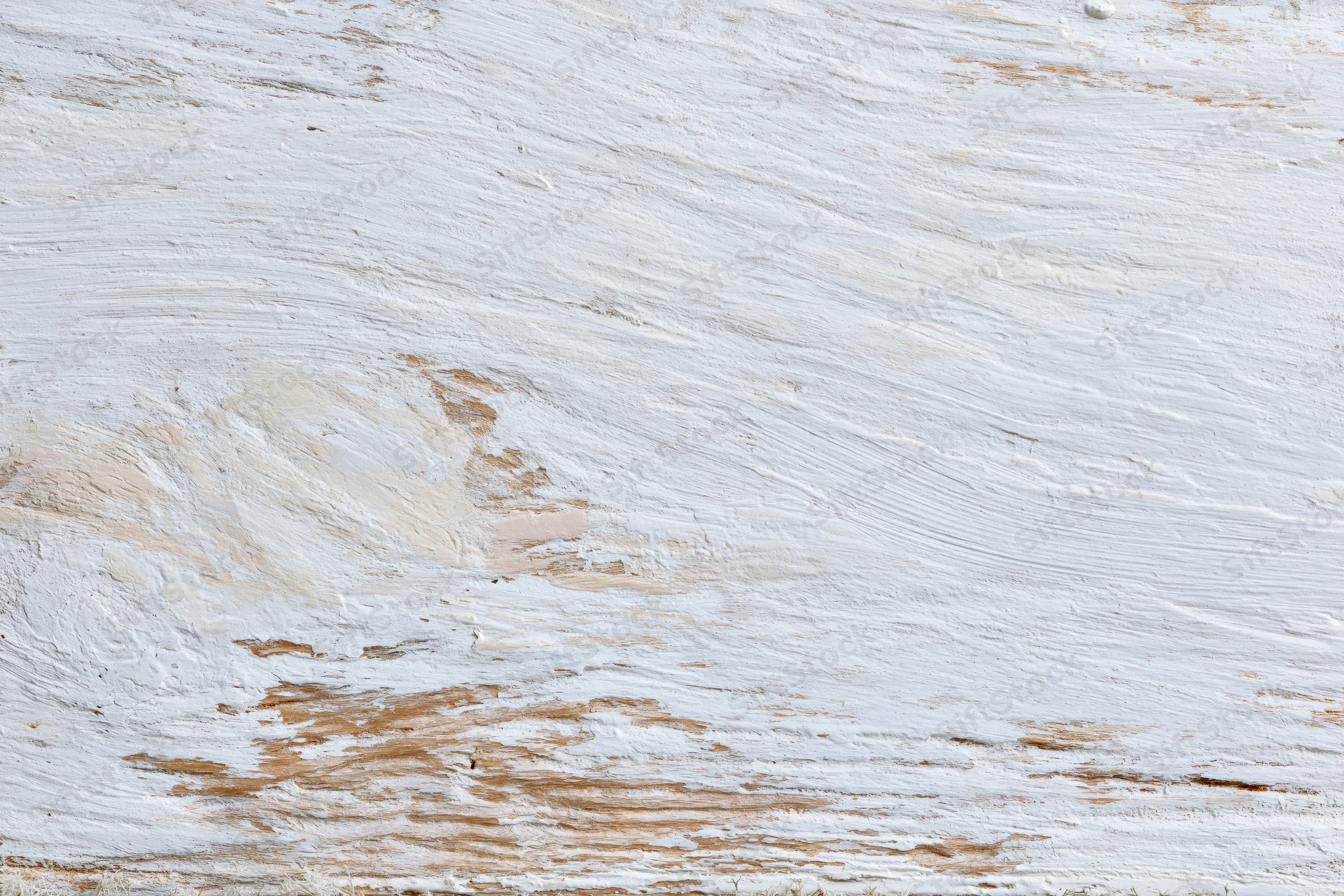 Weathered wooden surface painted white with peeling paint and visible grain