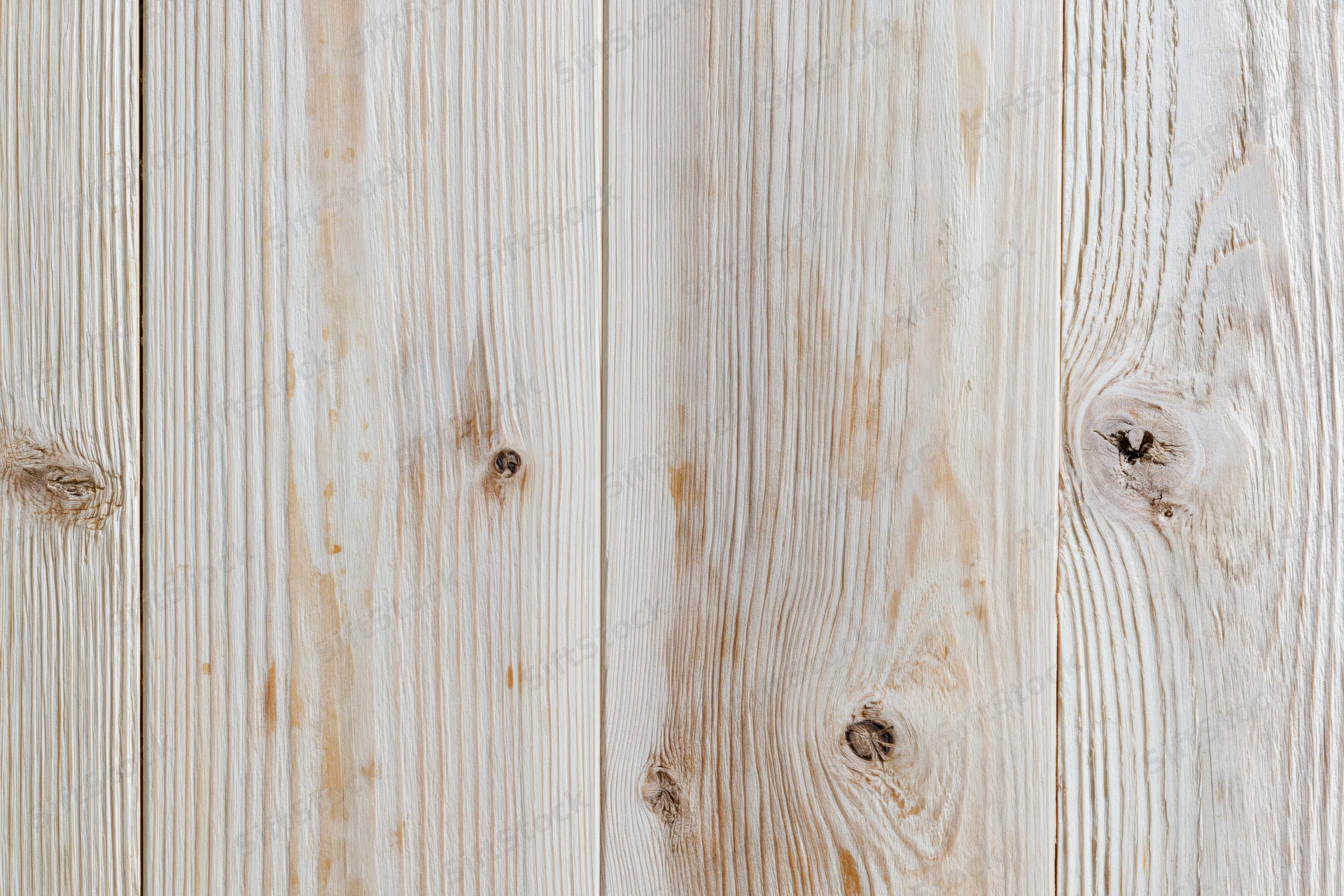 Pale bleached wood planks arranged vertically as a flat lay surface