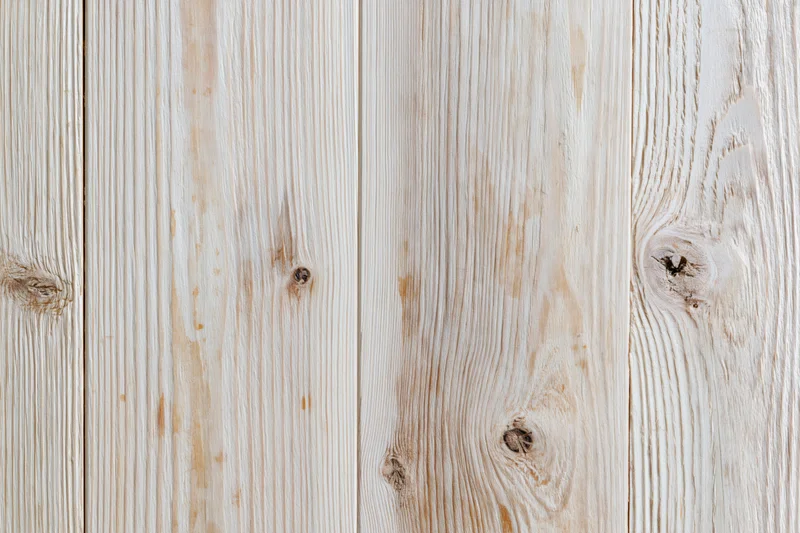 Pale bleached wood planks arranged vertically as a flat lay surface
