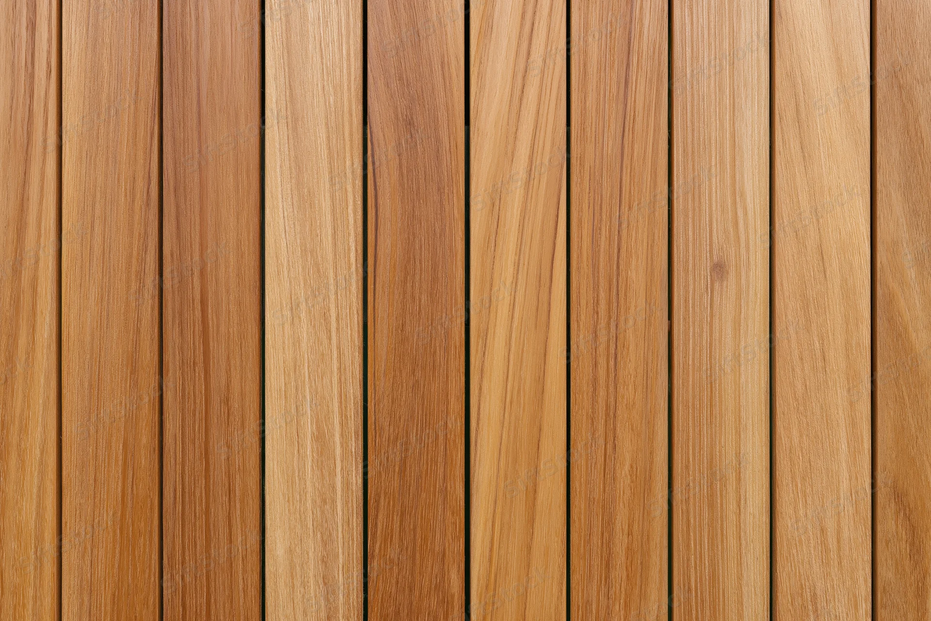 Vertical teak wood planks arranged in a flat lay forming a textured surface