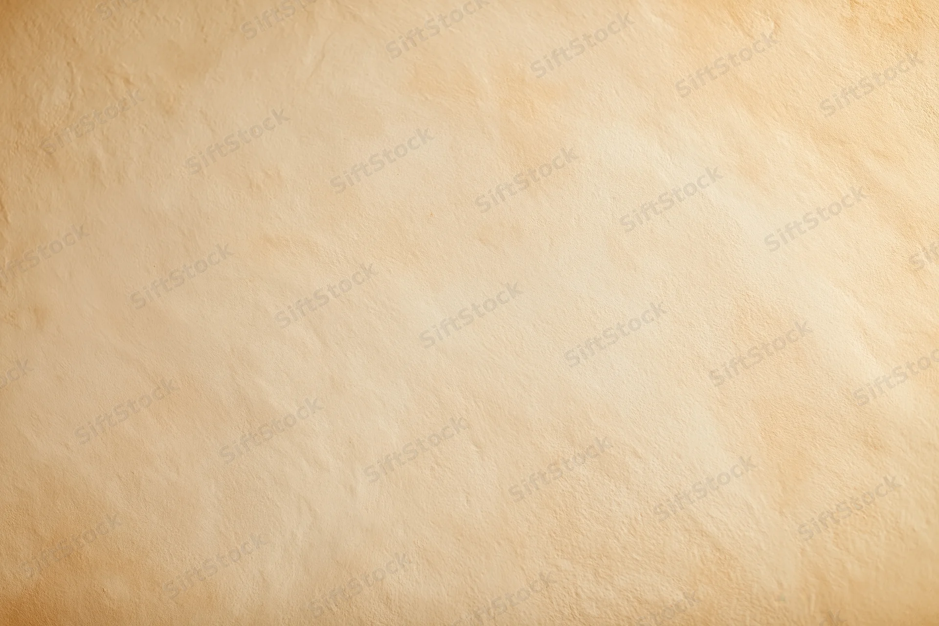 Close-up of a plain painted concrete wall surface with smooth texture and beige tone, used as background or copyspace