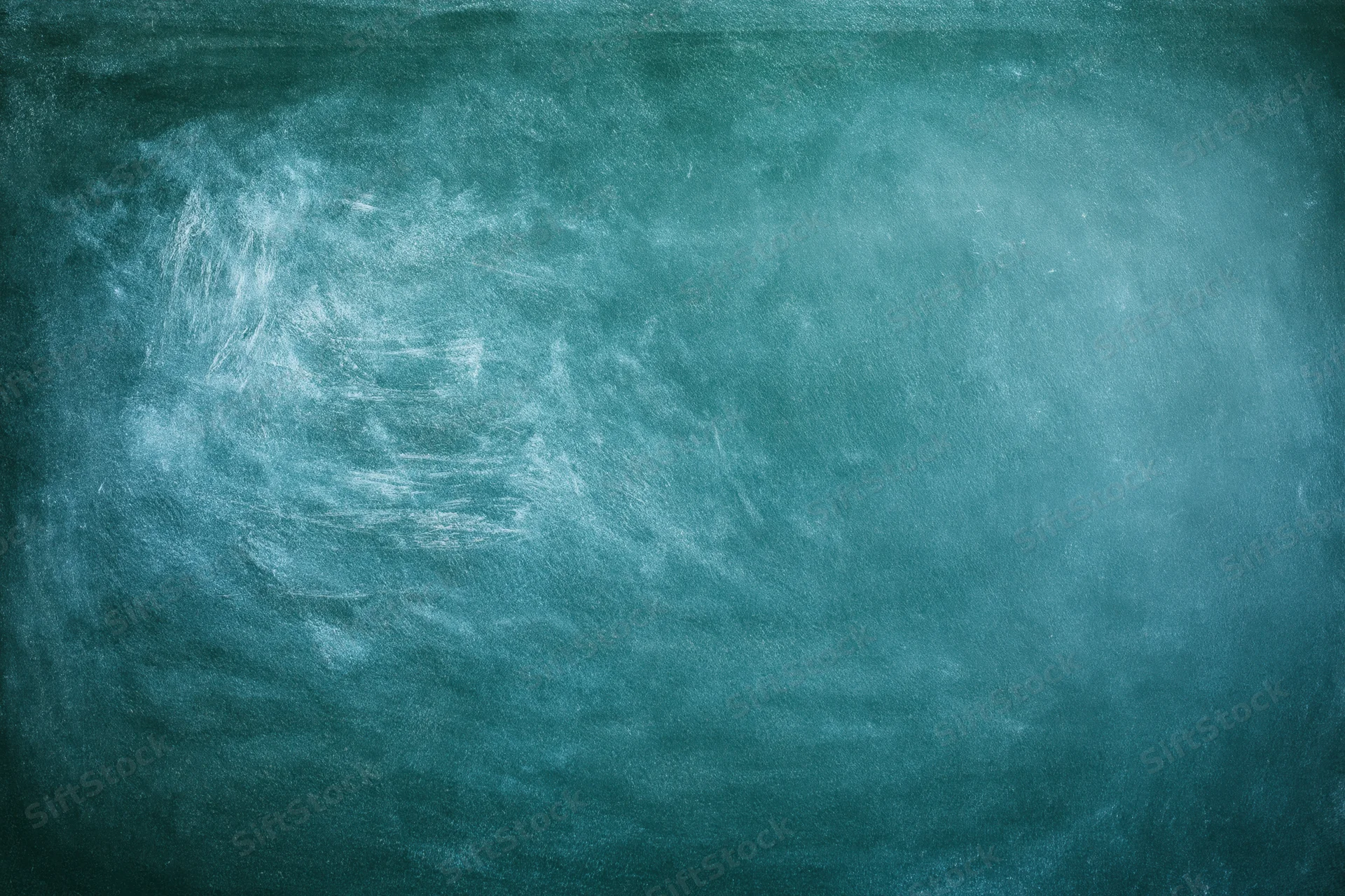 Worn green chalkboard surface with white chalk residue and smudges, flat close-up view