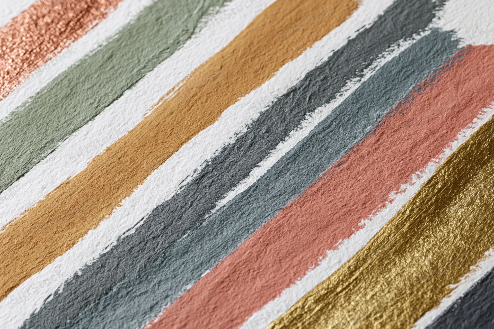 Diagonal paint swatches in various colors applied on textured white surface