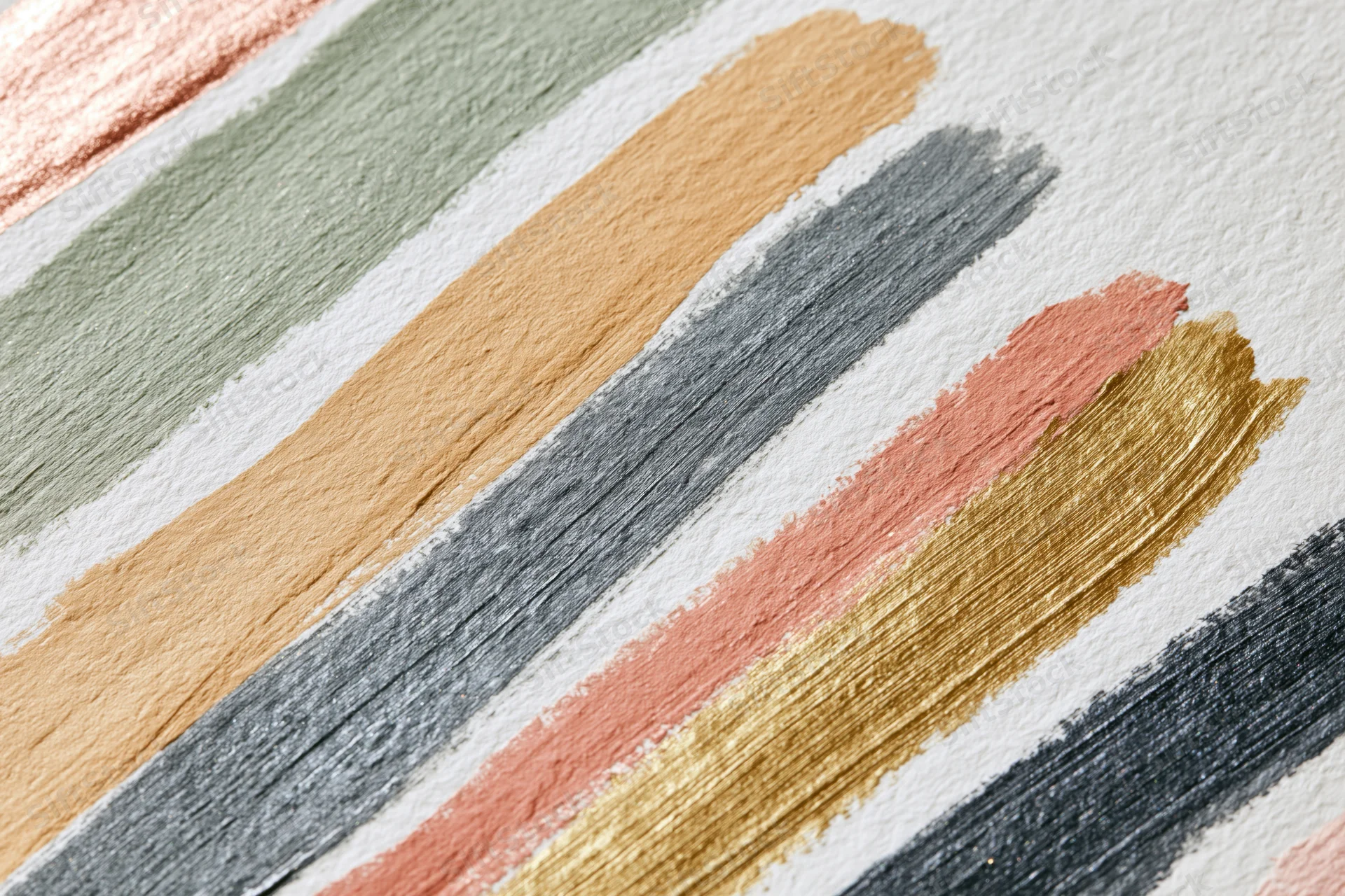 Diagonal paint brushstroke swatches on textured white paper