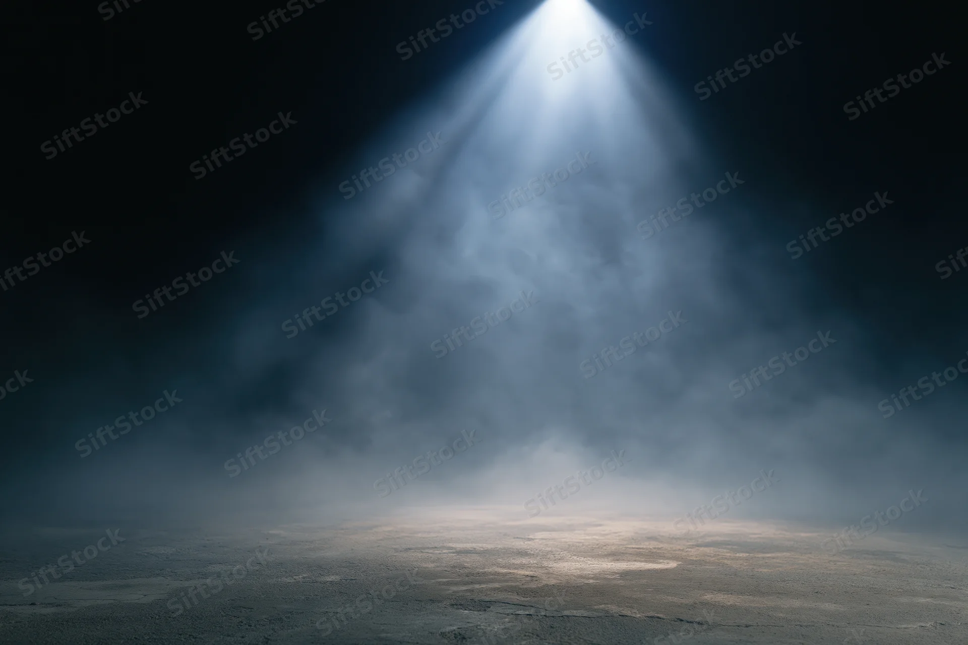 Single spotlight illuminating empty dark stage floor with fog