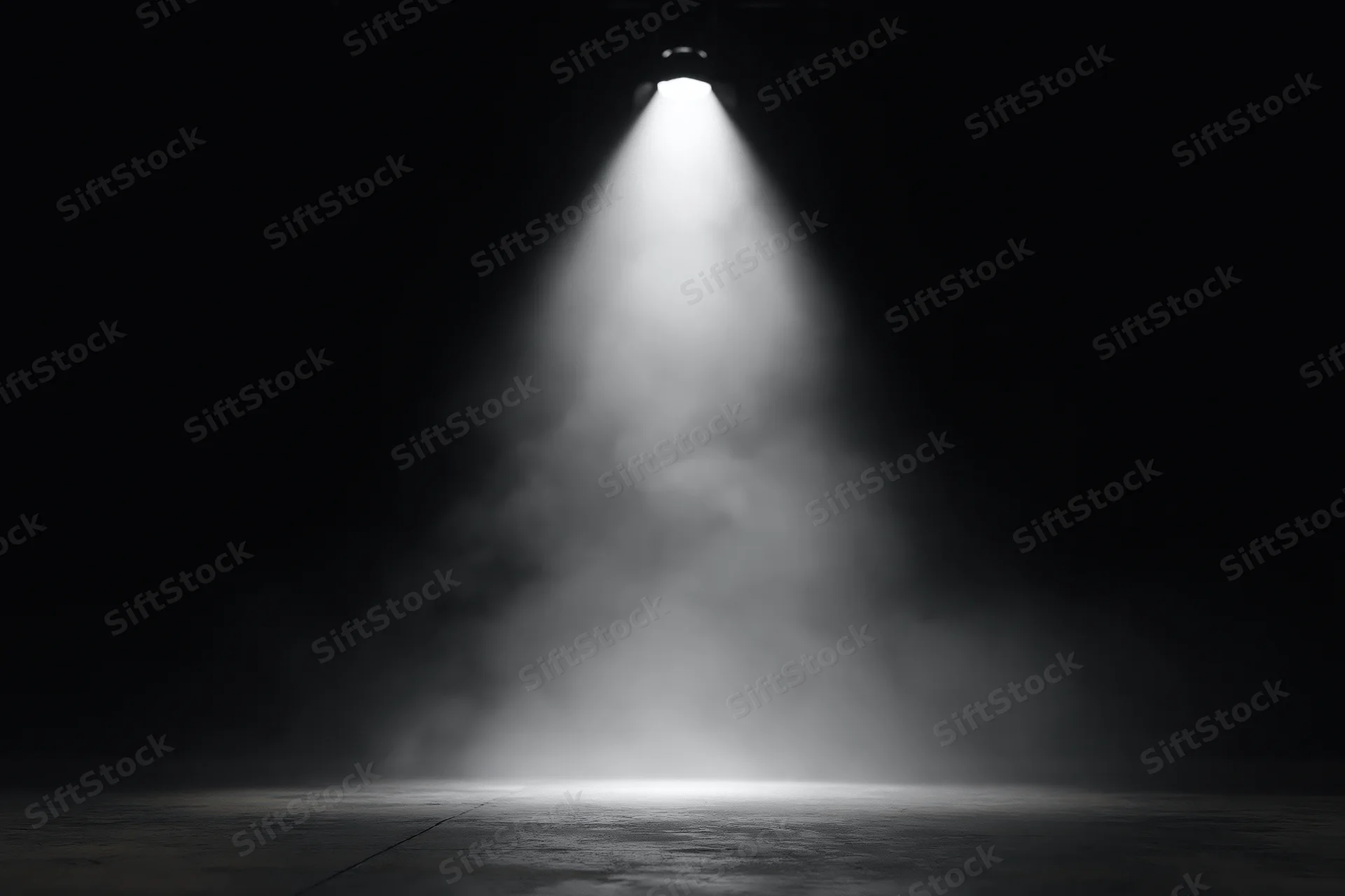 Single overhead spotlight illuminating empty dark stage with smoke and beam of light