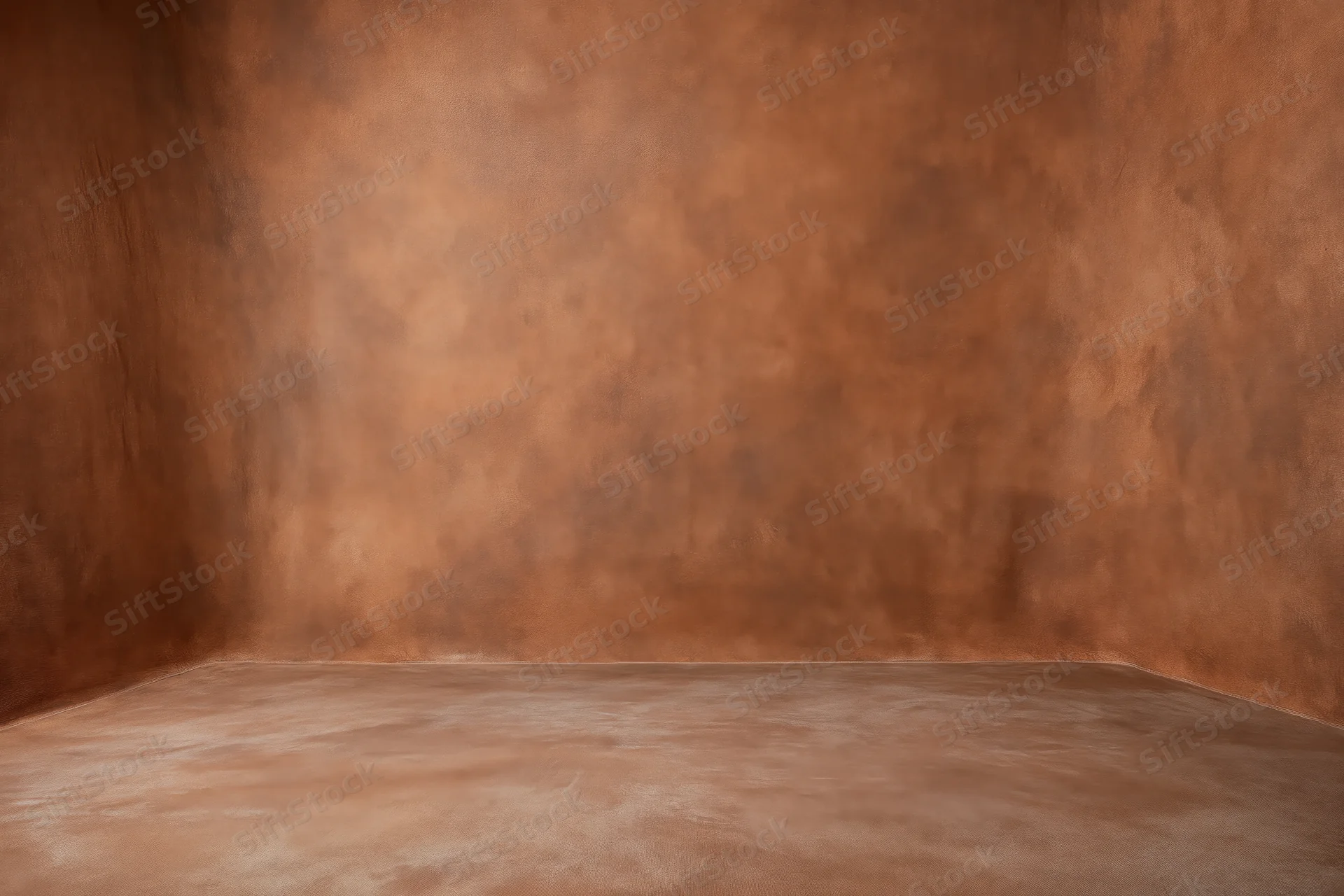 Empty studio backdrop with warm hand-painted muslin texture for photography
