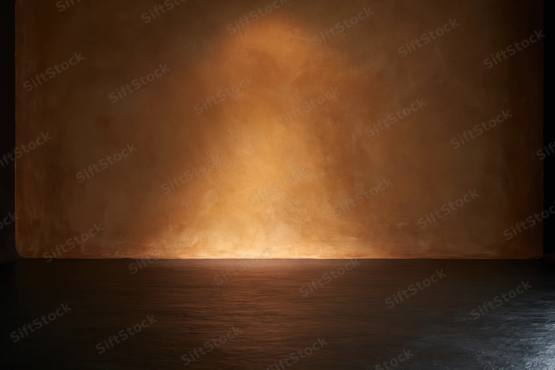 Textured painted canvas wall illuminated by spotlight in empty studio space