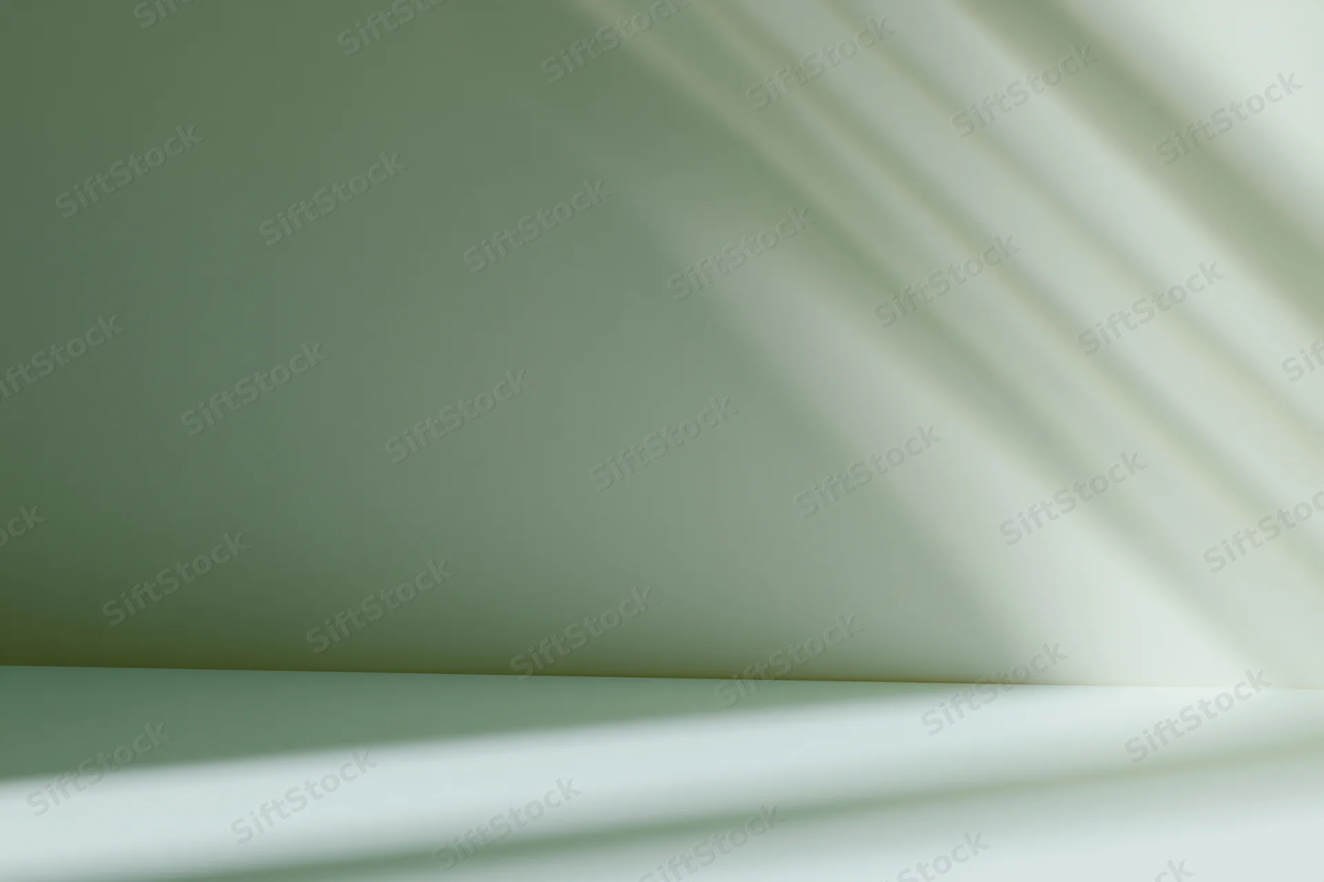 Seamless sage green studio backdrop with soft lighting and shadow gradient for product photography