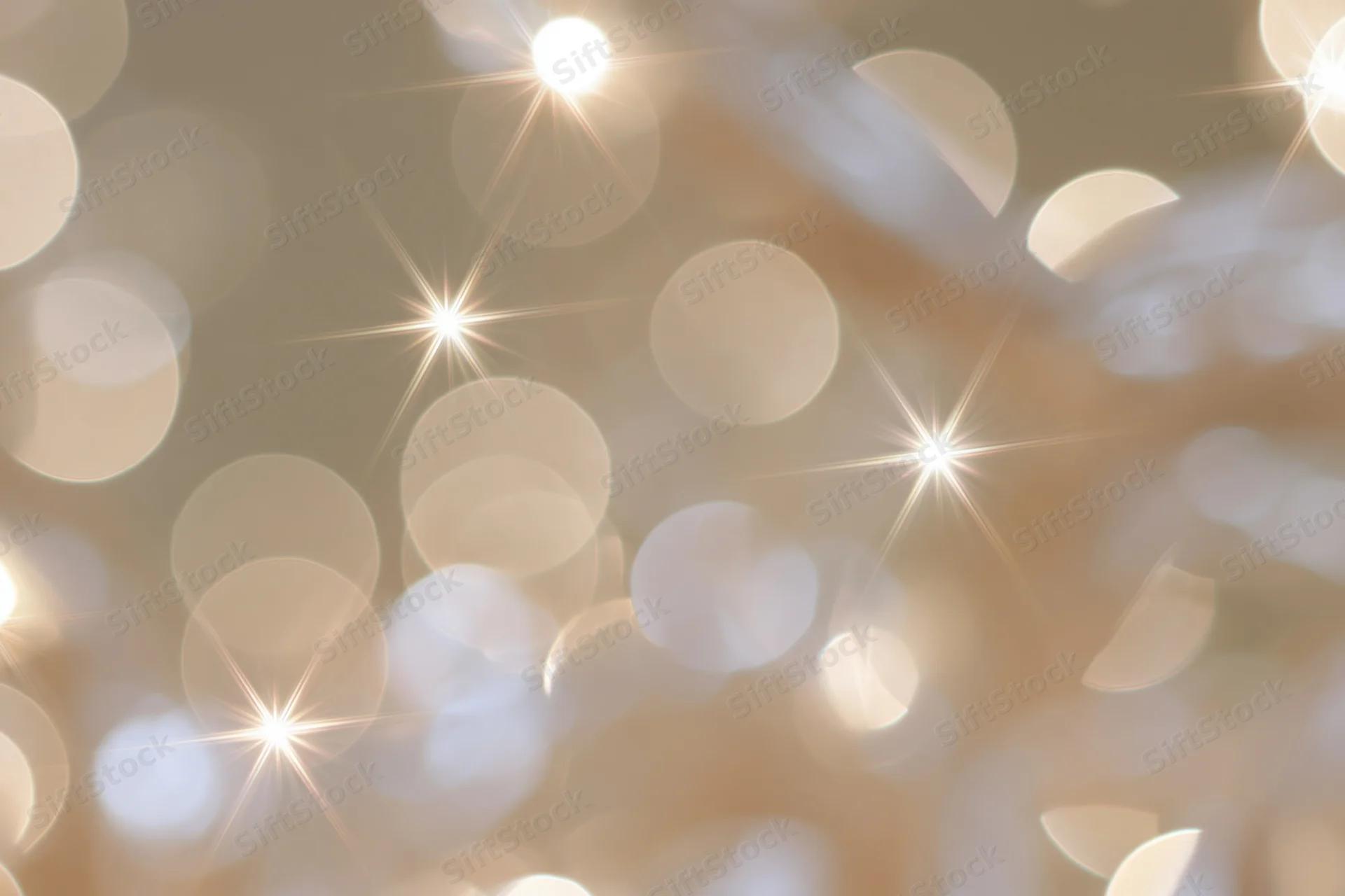 Abstract bokeh lights in warm golden tones forming a festive holiday background